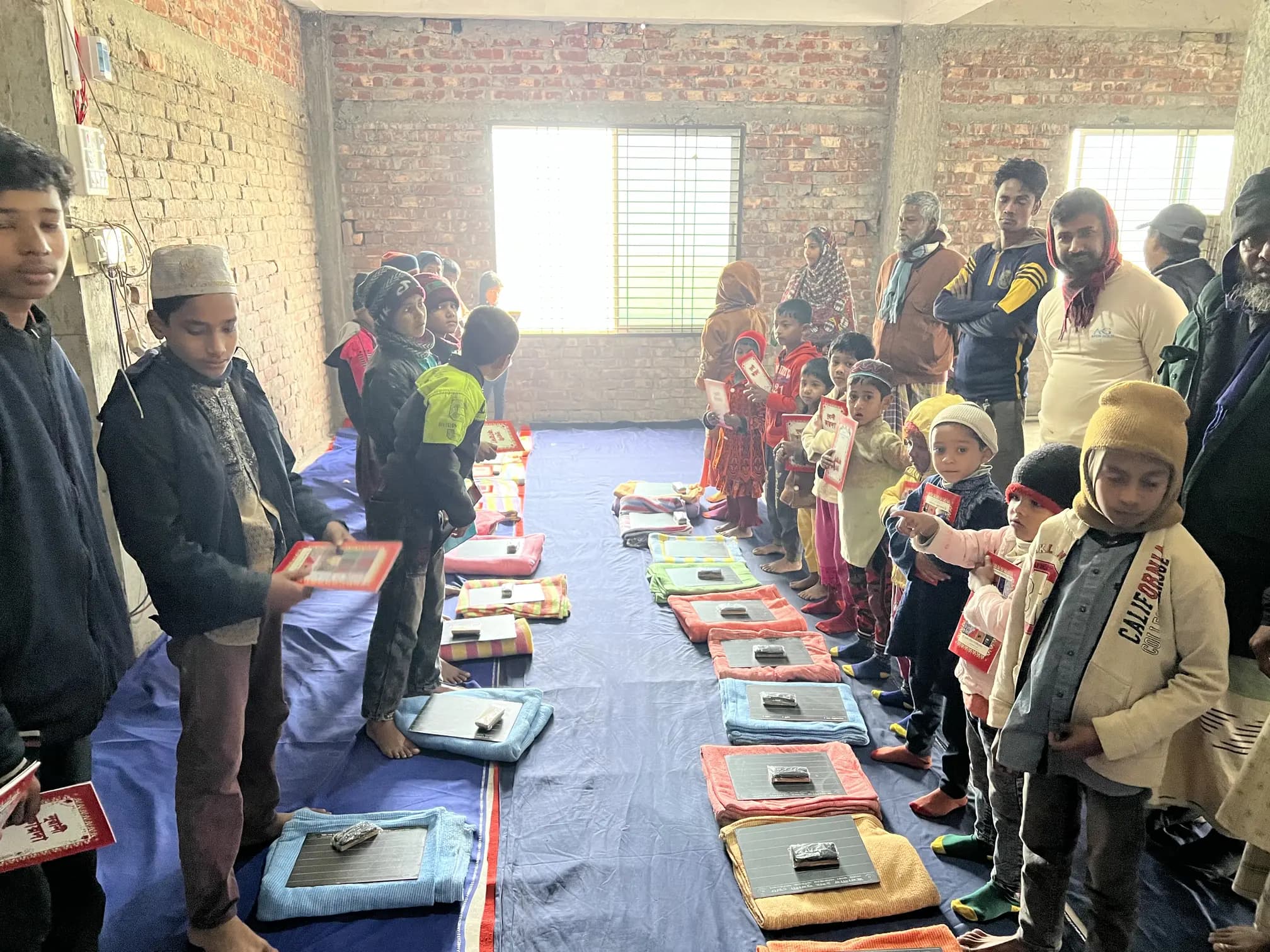 Image - Kids with blankets and materials